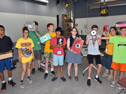 Young participants show off projects they constructed at a previous edition of the summer enrichment camp Sheldon Institute