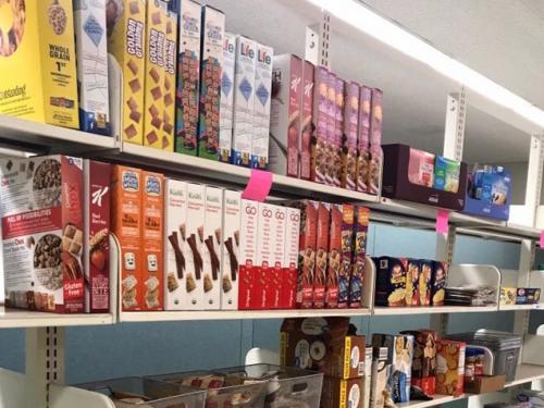 Food pantry shelves filled with offerings