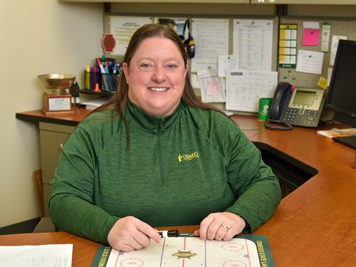 Women's hockey coach Diane Dillon and her team are active in service