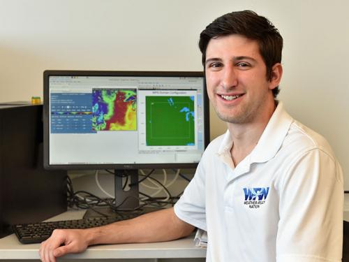 Zachary Hiris in a meteorology lab