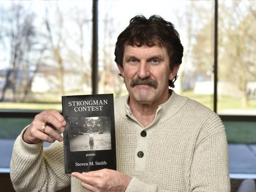 Steven M. Smith, Writing Center Director and SUNY Oswego Alumni, recently debuted his first poetry collection titled Strongman Contest