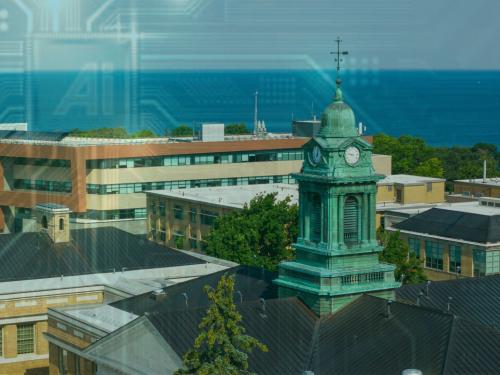 A drone view of SUNY Oswego’s campus featuring the iconic Sheldon Hall clocktower, academic buildings and Lake Ontario. A digital circuit pattern and the letters “AI” are subtly overlaid.