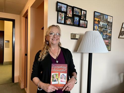 After losing both her daughters nearly two years ago in a car crash, Tina Trumble, whose day job is serving students in the Financial Aid Office, has written a book, “Everything Beautiful,” to help others heal and raise money for a scholarship.
