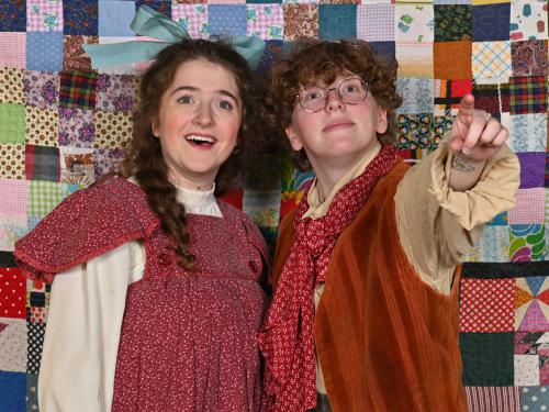 Tati Copp, left, as Winnie Foster, and Ethan Soda as Jesse Tuck, ponder immortality in SUNY Oswego's production of "Tuck Everlasting"