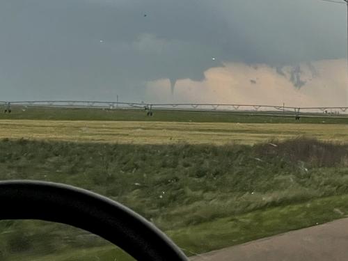 SUNY Oswego’s storm-chasing class traveled through southwestern Kansas and captured an image of a suspected tornado south of Plains, Kansas, on May 28. 