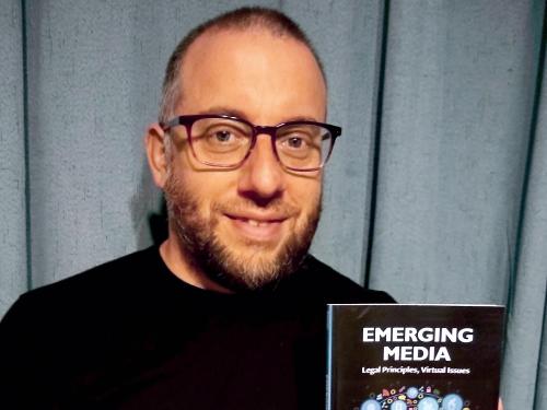 Jason Zenor with book about emerging issues in media law