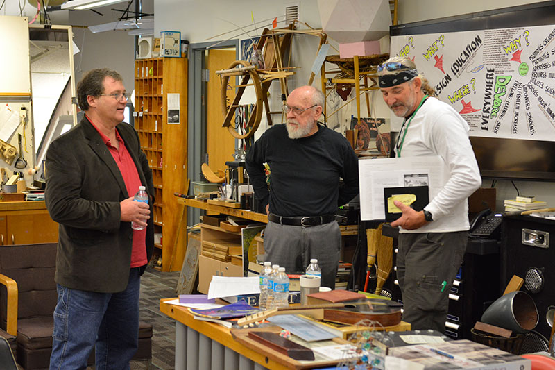 Technology faculty member John Belt speaks with alumni