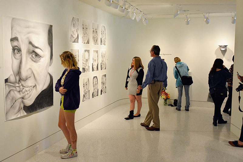 Students at BFA exhibition reception