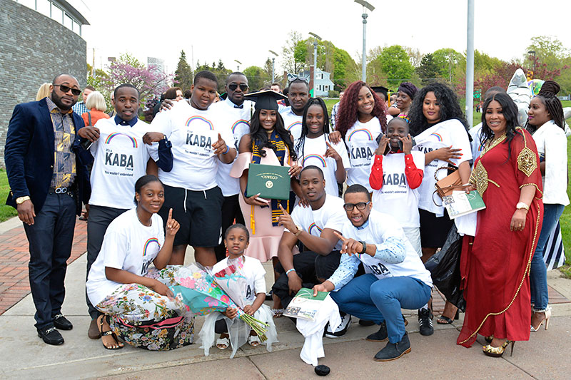 Graduate Cire Kaba with family and friends