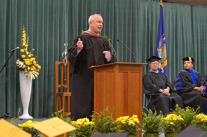 Thomas Schneider speaking at Commencement