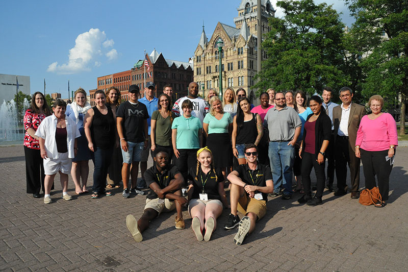 Faculty, staff and Laker Leaders orientation guides welcome new students at SUNY Oswego in Syracuse.