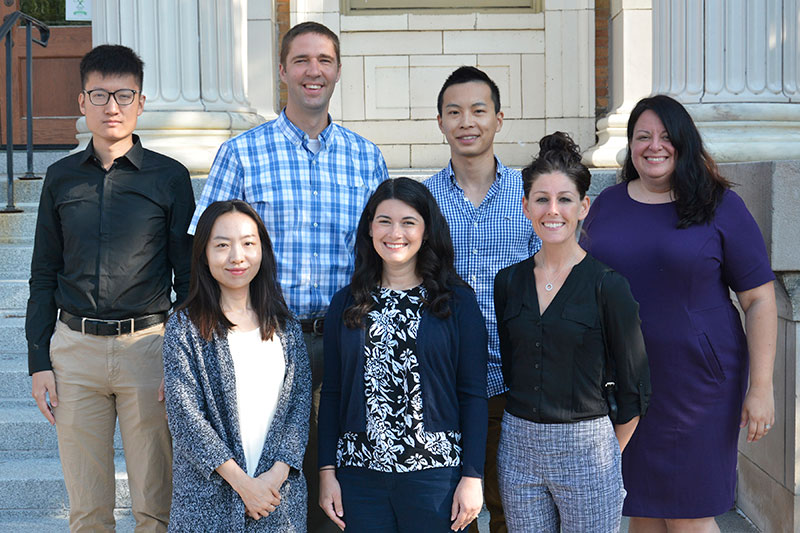 New faculty members on steps of Sheldon Hall