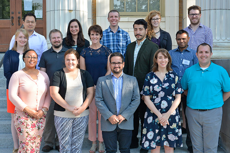 New faculty members on steps of Sheldon Hall