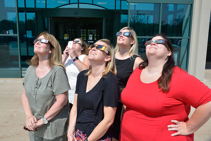 Staff viewing solar eclipse