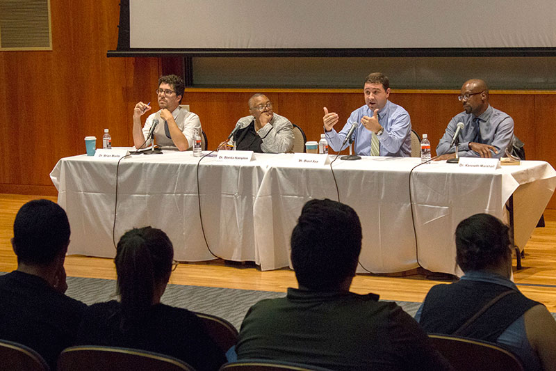 Brent Axe of Syracuse.com and ESPN Radio speaks at 'Taking A Knee' panel