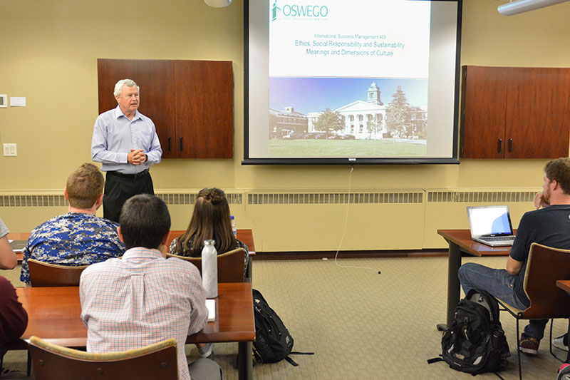 James Rogers '76, senior contracts manager/consultant for engineering company WorleyParsons, speaks to class