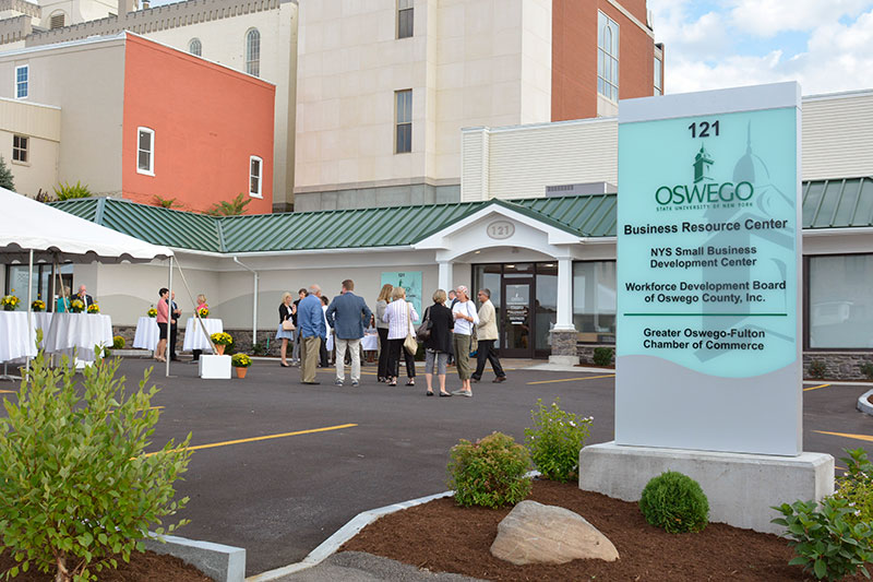 Attendees of Open House for SUNY Oswego's Office of Business and Community Relations new locations