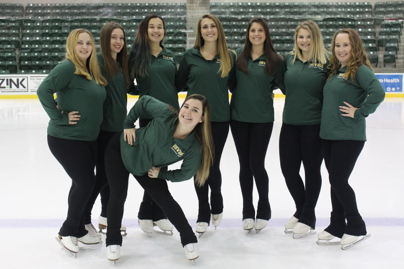 Members of the Ice Effects, SUNY Oswego's student synchronized skating team, gather