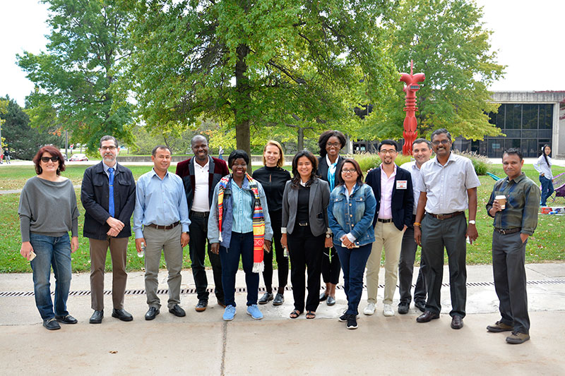 Ulises Mejias leads visiting Humphrey Fellows on campus tour