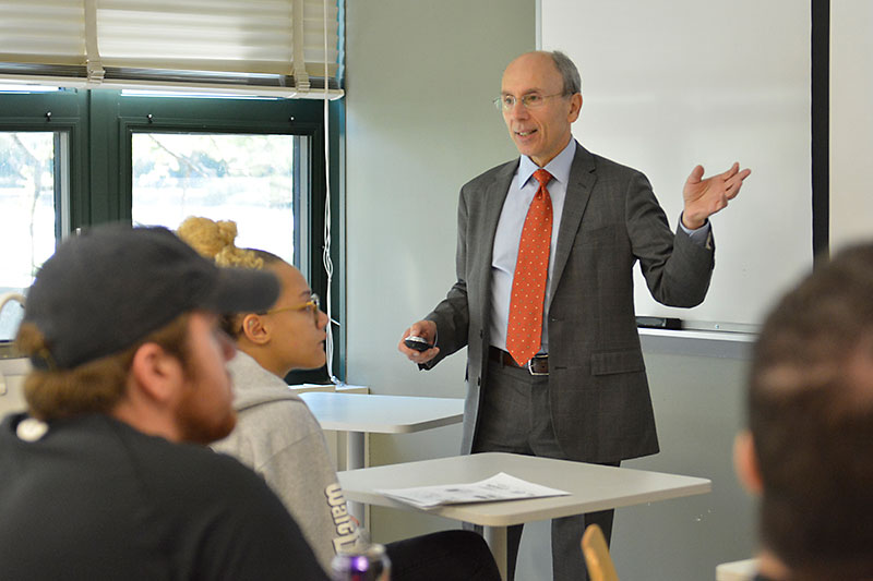 Distinguished Professor Richard Rosenfeld speaks to trauma studies class