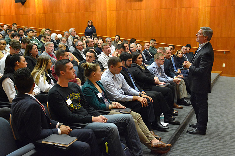 Bob Moritz speaking to a full house in Marano Campus Center auditorium