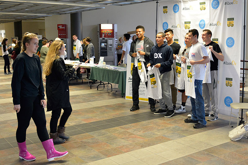 Students pose with It's On Us T-shirts for taking the pledge to stop sexual violence