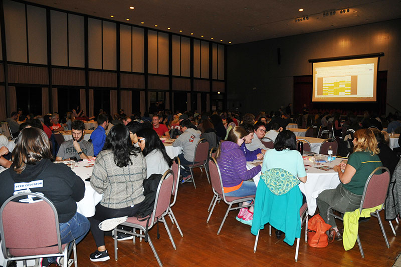 Tables of students taking part in bingo fundraiser