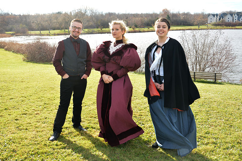 Director with actresses in costume promoting upcoming Dracula production