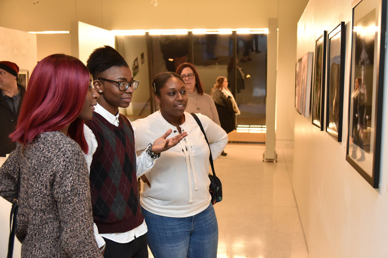 Students view juried student art exhibition