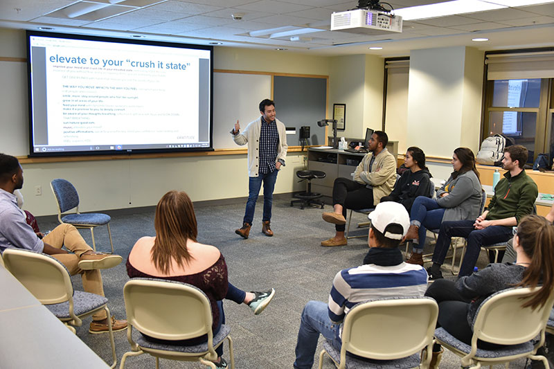 Alumnus Anthony DeMario speaks with students about sales and broadcasting