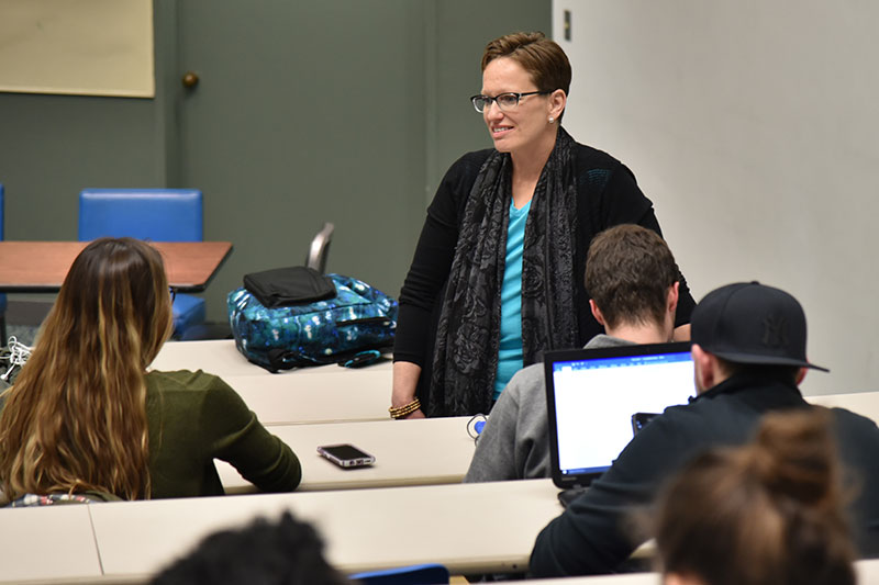 Jennifer Sawyer Norvell, Jennifer Sawyer Norvell, an alumna and complex litigation counsel for U.S. Army Trial Defense Service, talks with students