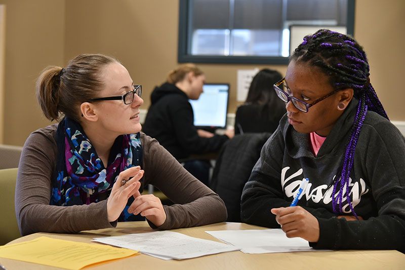 Tutors working at Writing Center