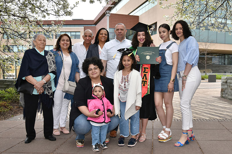 Graduate Angely Rosa celebrates with her family