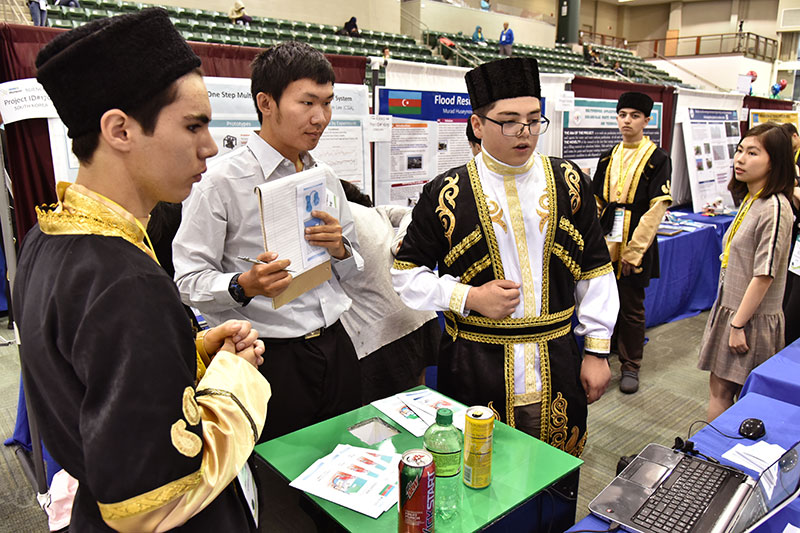 Two students from Azerbaijan explain research during GENIUS Olympiad