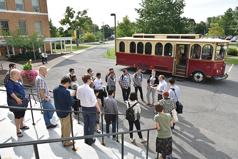 New employees learn about college history