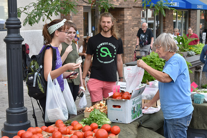 Students take part in College Night at Oswego Farmers Market