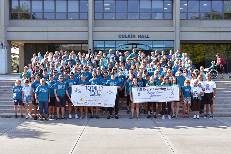 Students, faculty and staff show their teal
