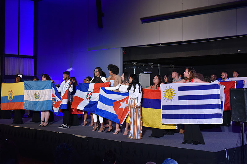 Students display flags of many nations