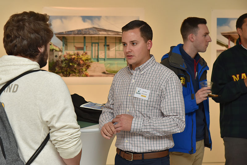 Jordan Harmon speaks to students at networking event