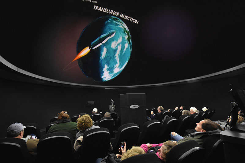 Visitors enjoy planetarium show