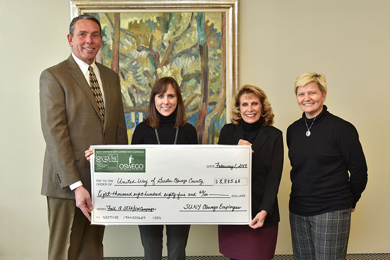 College presents check in support of United Way