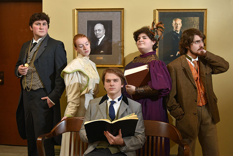 Cast of The Good Doctor pose with books in period costumes