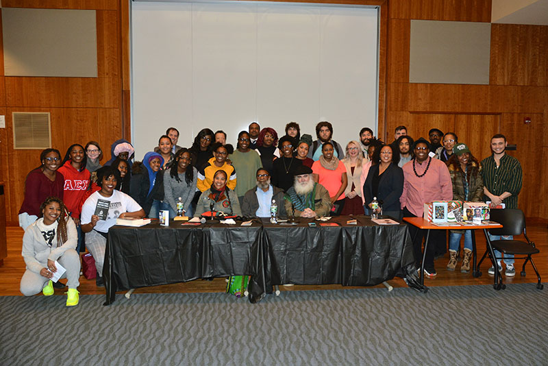 Students, faculty, staff and administrators gather for a group photo with featured guests following Students, faculty, staff and administrators gather for a group photo with featured guests following Spring Colloquium