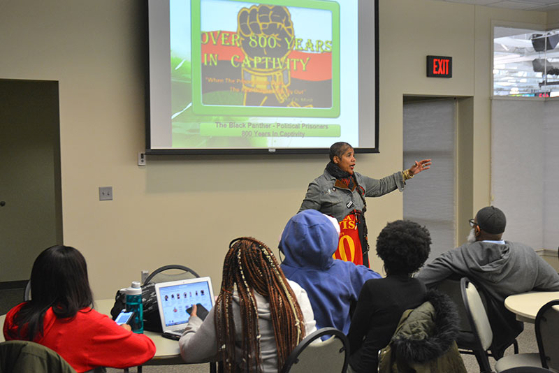 Guest panelist déqui kioni-sadiki leads a workshop at Spring Collquium