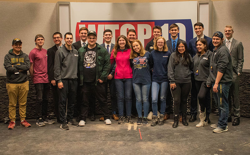 WTOP-TV crew members gather after another successful broadcast