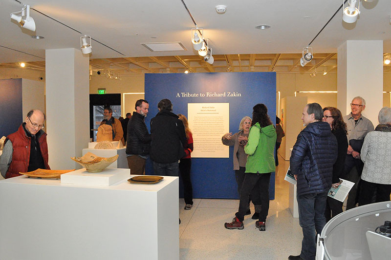 Visitors browse Faculty Art Exhibition