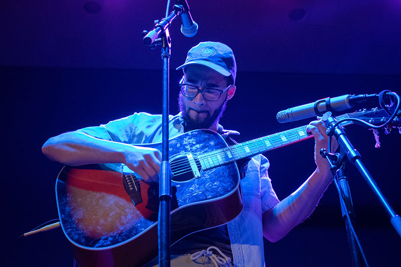 Evan Diem plays guitar in Battle of the Bands