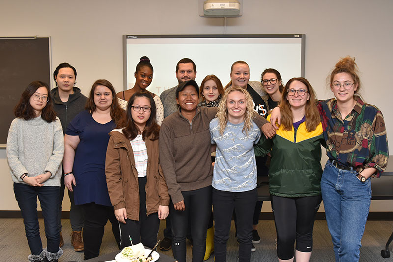 Alumna Jayme McCreary gathers with students active in Women in Computing and the Human-Computer Interaction Organization