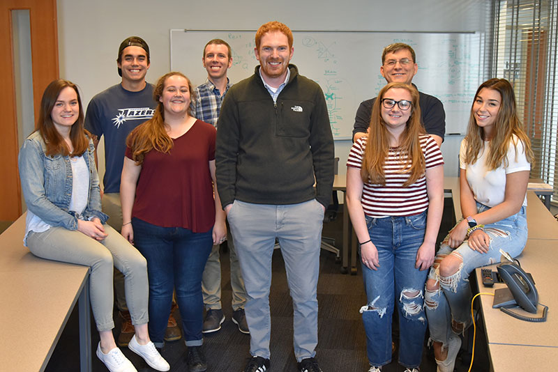 Dr. Brian Schultz meets with Chemistry Club students and faculty