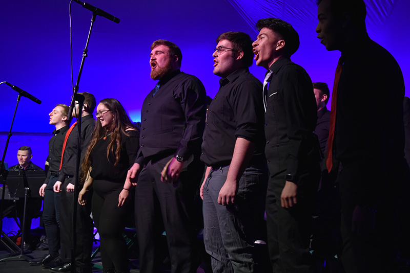 The Senior Sing with studentsunder the direction of music faculty member Mihoko Tsutsum